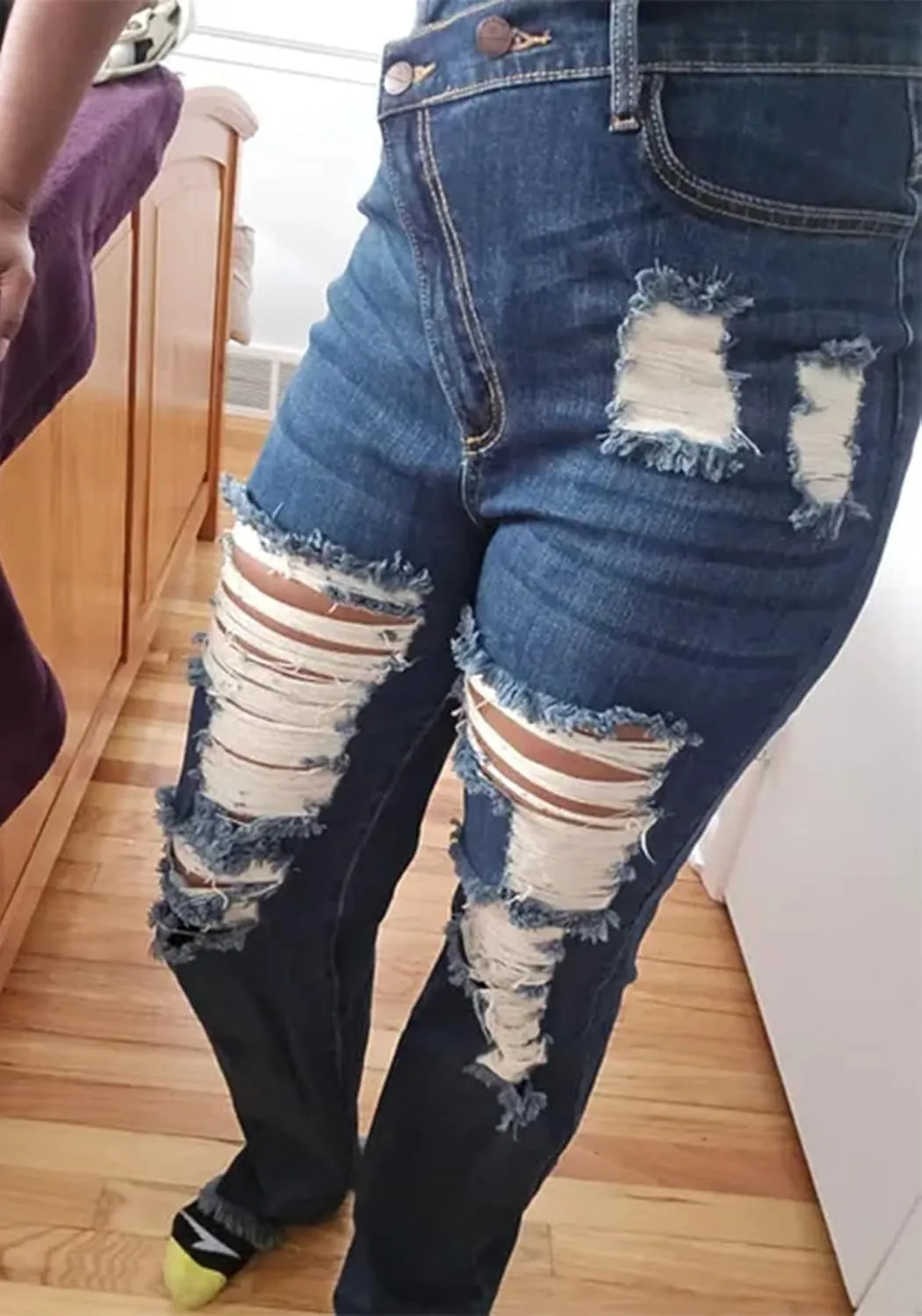 Tcremisa Ripped Jeans for Women Trendy High Waist Corssover Boyfriend Jeans Distressed Stretchy Asymmetric Flared Denim Pants